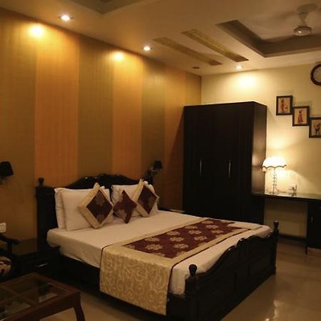 Hotel Universe Inn New Delhi Værelse billede